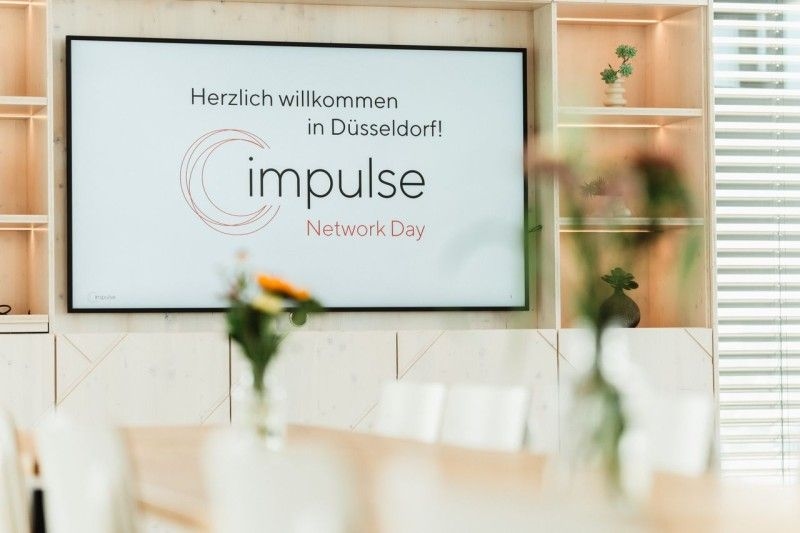 Willkommensbildschirm zum Network Day impulse